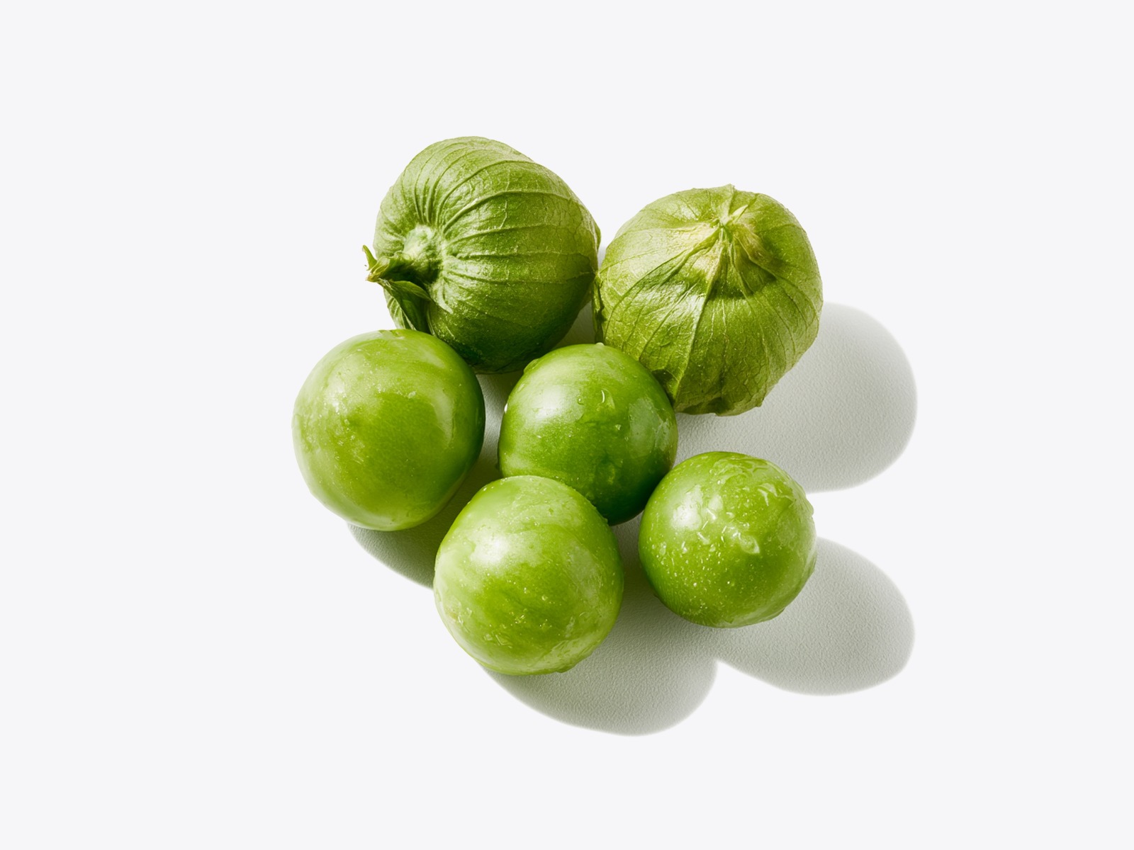 Green tomatillos with papery husks